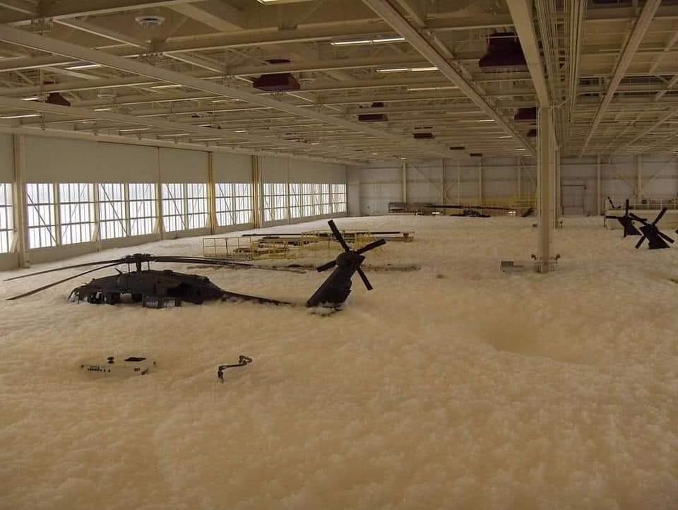Blackhawk helicopters covered in fire retardant foam. Photo courtesy of Reddit