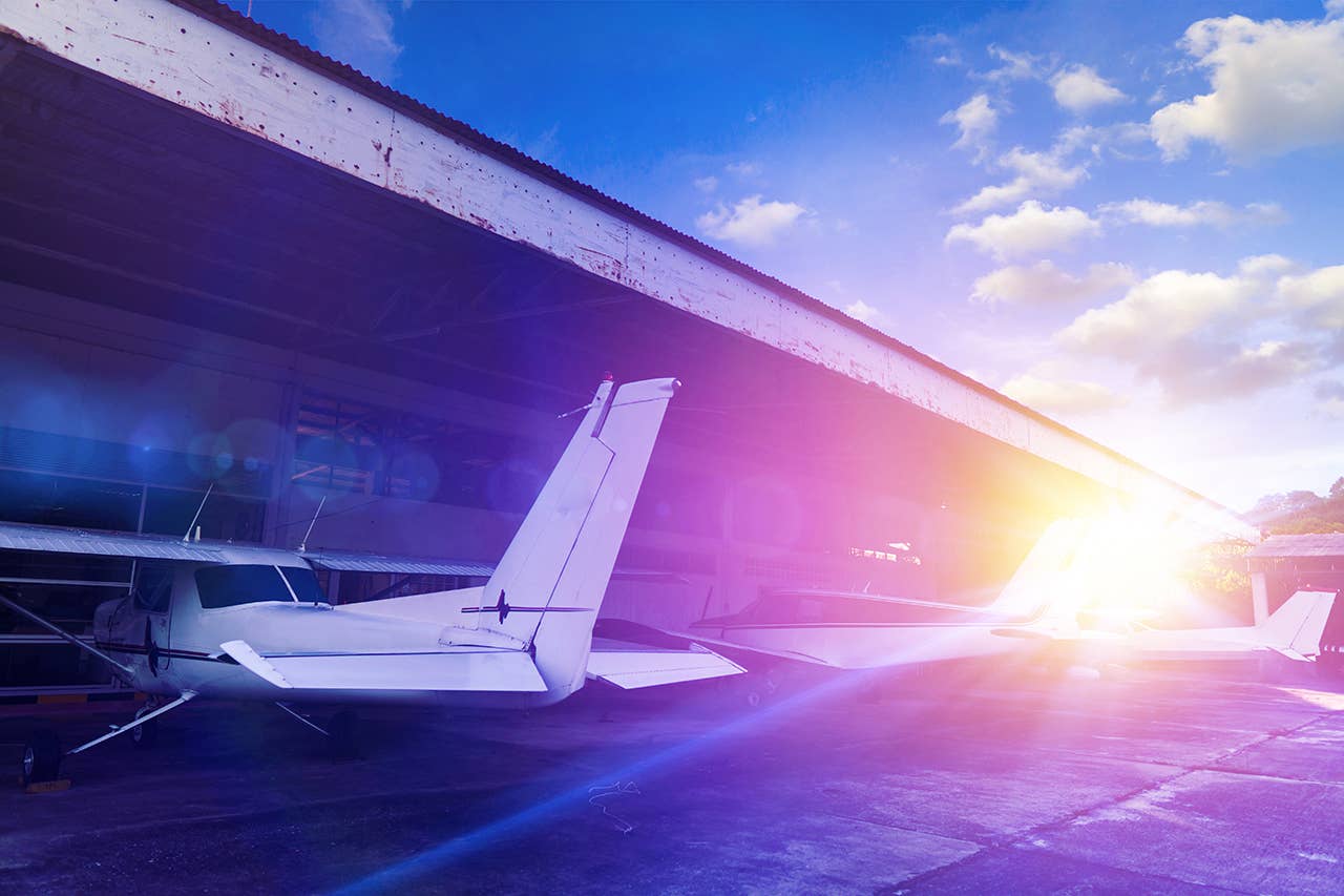 Flight training plane in a hangar