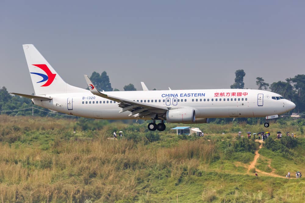 A China Eastern Boeing 737-800 - Black Box Found In China Boeing 737 Crash. - Plane & Pilot